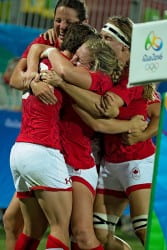 Lukan and Canadian Olympic teammates embrace