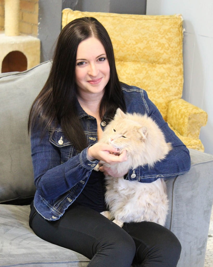 Elizabeth Feldhousen holding an orange cat