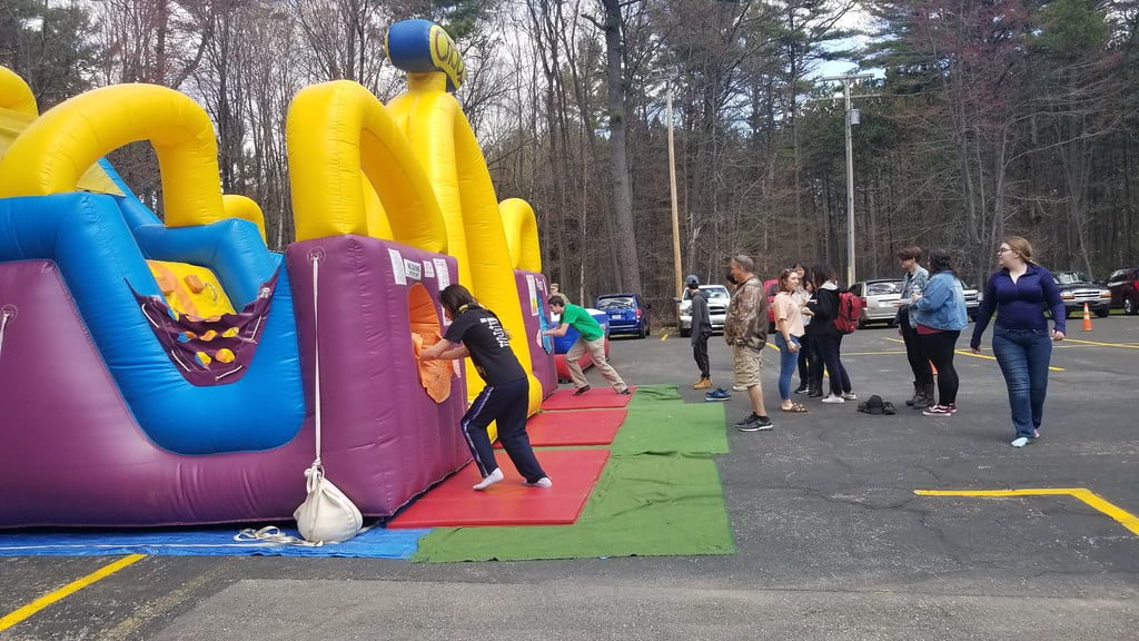 Inflatable bounce houses at the Marinette Campus End of the Year Bash