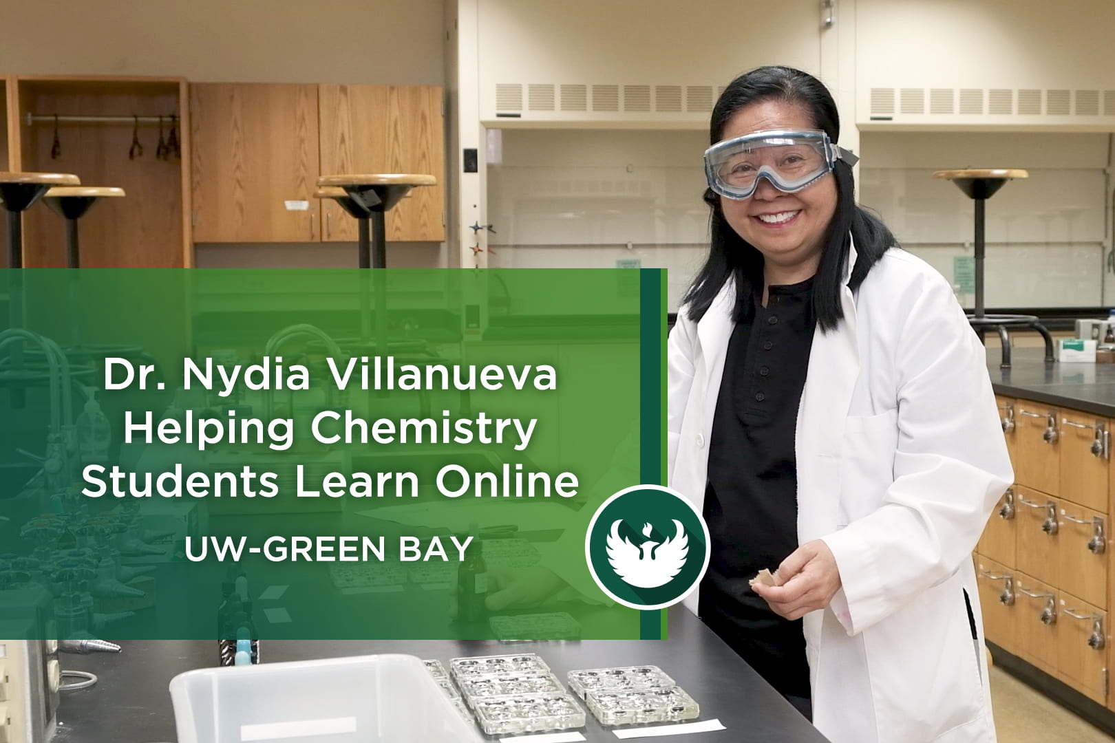 Photo with graphic title picturing Senior Lecturer Nydia Villanueva preps for an experiment on quantitative analysis in the chemistry lab at UW-Green bay, as she gets ready to teach students in Principals of Chemistry II Lab at UW-Green Bay.