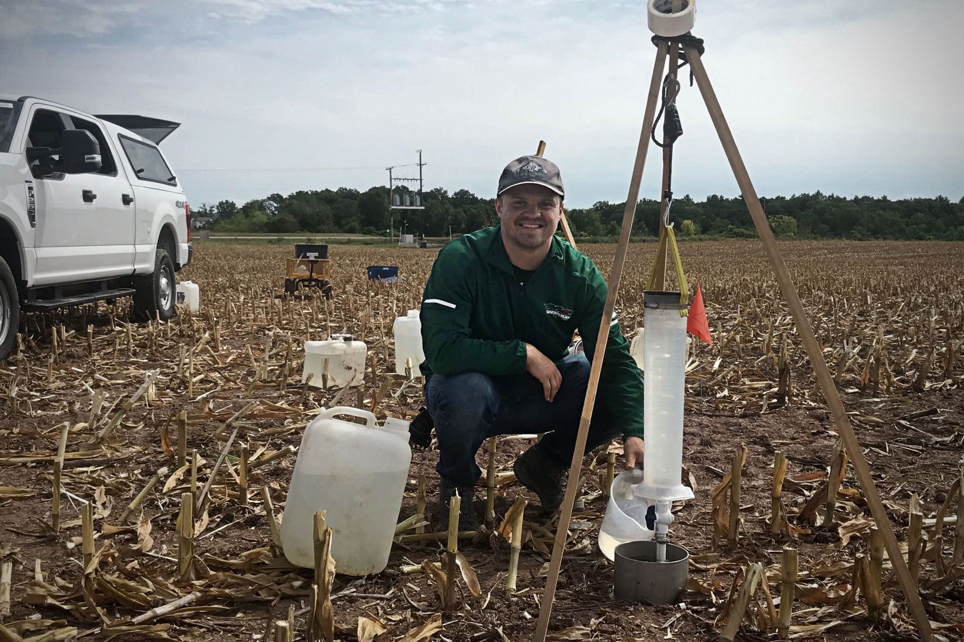 UW-Green Bay Environmental Science student Jacob Derenne studying soil health and water quality.