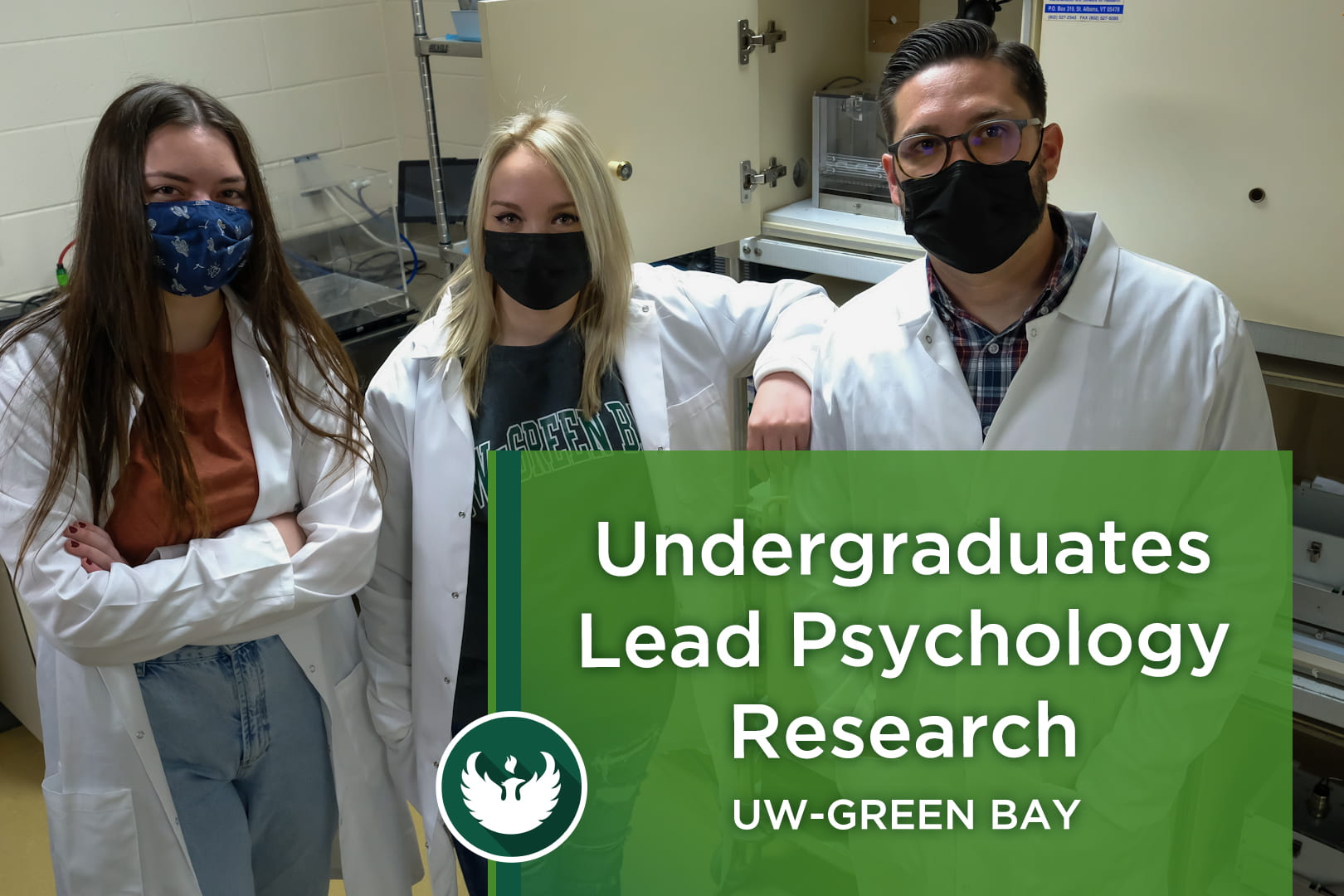 Two UW-Green Bay Psychology research students and Assistant Professor Todd Hillhouse pose for a photo inside the Pain and Addiction Neuropharmacology Lab (PANE Lab) in the Lab Sciences building at the Green Bay Campus.