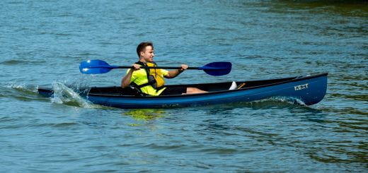 A student having fun kayaking canoeing on the Bay of Green Bay during GB Week’s Boats on the Bay event.