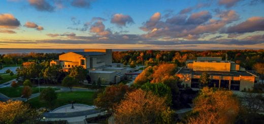 The view from the 8th floor of the Cofrin Library of Weidner Center and Theatre Hall bathed in sunset light on the UW-Green Bay, Green Bay campus.