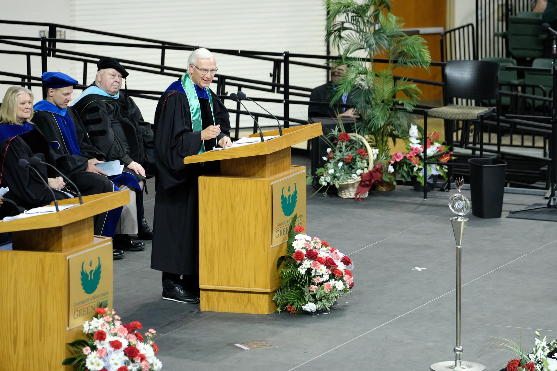 International businessman Dick Gochnauer addresses students graduating in UW-Green Bay's Cofrin School of Business and the College of Science, Engineering and Technology.